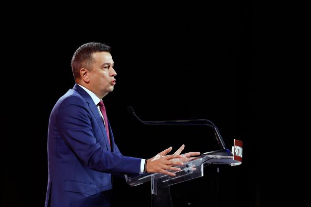 (251108) -- BUCHAREST, Nov. 8, 2025 (Xinhua) -- Sorin Grindeanu addresses members of Romania's ruling Social Democratic Party (PSD) during the party's extraordinary congress in Bucharest, Romania, Nov. 7, 2025. Sorin Grindeanu was elected president of Romania's ruling Social Democratic Party (PSD) on Friday during the party's extraordinary congress in Bucharest.
  Grindeanu, the sole candidate, received 2,787 votes in favor, with eight abstentions, formalizing his position after serving as interim leader following Marcel Ciolacu's resignation in May. (Photo by Cristian Cristel/Xinhua)