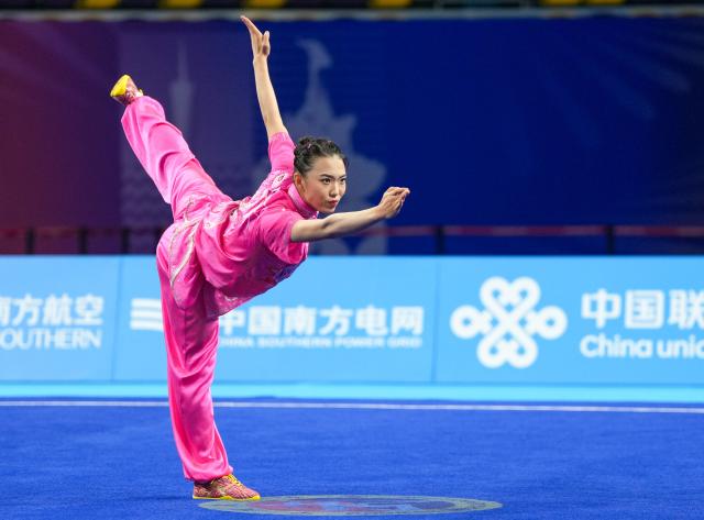 (251108) -- GUANGZHOU, Nov. 8, 2025 (Xinhua) -- Wang Ziwen of Hebei competes during the Changquan competition of women's Changquan-Jianshu-Qiangshu of Wushu Taolu event at China's 15th National Games in Guangzhou, south China's Guangdong Province, Nov. 8, 2025. (Xinhua/Jigme Dorji)