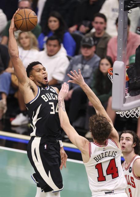 (251108) -- MILWAUKEE, Nov. 8, 2025 (Xinhua) -- Milwaukee Bucks' Giannis Antetokounmpo (L) dunks during the 2025-2026 NBA regular season game between Milwaukee Bucks and Chicago Bulls in Milwaukee, the United States, on Nov. 7, 2025. (Photo by Joel Lerner/Xinhua)