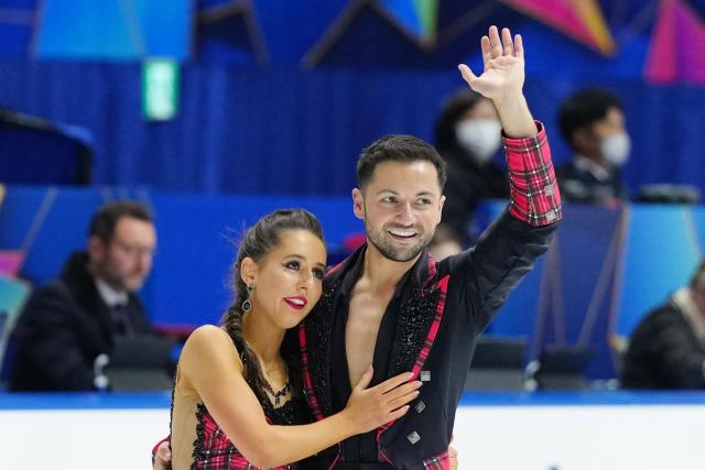 (251108) -- OSAKA, Nov. 8, 2025 (Xinhua) -- Lilah Fear/Lewis Gibson (R) of Britain react during the ice dance free dance at ISU Figure Skating Grand Prix 2025 in Osaka, Japan, Nov. 8, 2025. (Xinhua/Jia Haocheng)