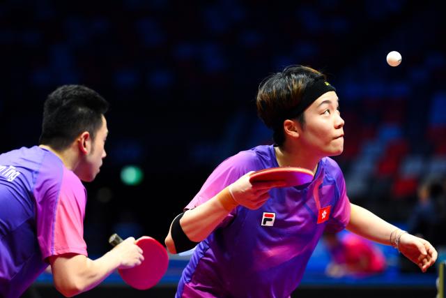 (251108) -- MACAO, Nov. 8, 2025 (Xinhua) -- Wong Chun Ting/Doo Hoi Kem (R) compete during the table tennis mixed doubles round of 16 match between Wong Chun Ting/Doo Hoi Kem of Hong Kong and Zhou Yu/Zang Xiaotong of Hebei at China's 15th National Games in Macao, south China, Nov. 8, 2025. (Xinhua/Cheong Kam Ka)