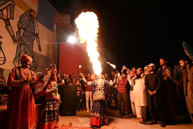 (251108) -- ISLAMABAD, Nov. 8, 2025 (Xinhua) -- Folk artists perform during the Lok Mela Festival in Islamabad, capital of Pakistan, Nov. 7, 2025. The annual ten-day folk festival kicked off here on Friday. (Photo by Ahmad Kamal/Xinhua)