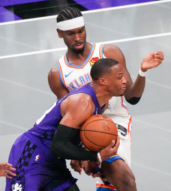 (251108) -- SACRAMENTO, Nov. 8, 2025 (Xinhua) -- Russell Westbrook (front) of Sacramento Kings breaks through during the 2025-2026 NBA regular season match between Sacramento Kings and Oklahoma City Thunder in Sacramento, the United States, Nov. 7, 2025. (Photo by Sun Yuxuan/Xinhua)