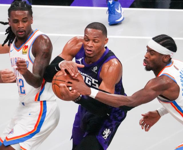 (251108) -- SACRAMENTO, Nov. 8, 2025 (Xinhua) -- Russell Westbrook (C) of Sacramento Kings breaks through during the 2025-2026 NBA regular season match between Sacramento Kings and Oklahoma City Thunder in Sacramento, the United States, Nov. 7, 2025. (Photo by Sun Yuxuan/Xinhua)