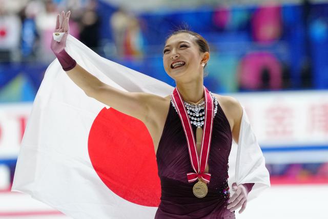 (251108) -- OSAKA, Nov. 8, 2025 (Xinhua) -- Gold medalist Sakamoto Kaori of Japan celebrates after the awarding ceremony for women's skating at ISU Grand Prix of Figure Skating NHK Trophy 2025 in Osaka, Japan, Nov. 8, 2025. (Xinhua/Jia Haocheng)