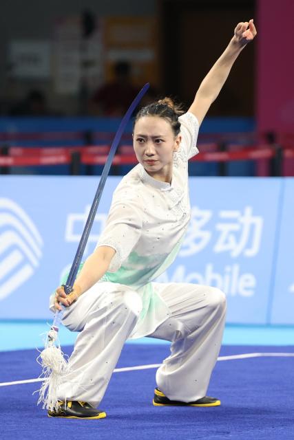 (251108) -- GUANGZHOU, Nov. 8, 2025 (Xinhua) -- Yao Yang of Shanxi competes during the Jianshu competition of women's Changquan-Jianshu-Qiangshu of Wushu Taolu event at China's 15th National Games in Guangzhou, south China's Guangdong Province, Nov. 8, 2025. (Xinhua/Yang Shiyao)