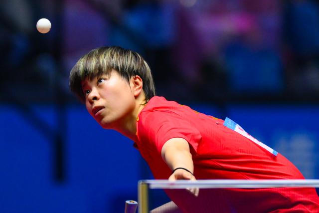 (251109) -- MACAO, Nov. 9, 2025 (Xinhua) -- Wang Yidi serves during the table tennis women's singles round of 32 match between Wang Yidi of Liaoning and Zhang Xiangyu of Beijing at China's 15th National Games in Macao, south China, Nov. 9, 2025. (Xinhua/Cheong Kam Ka)