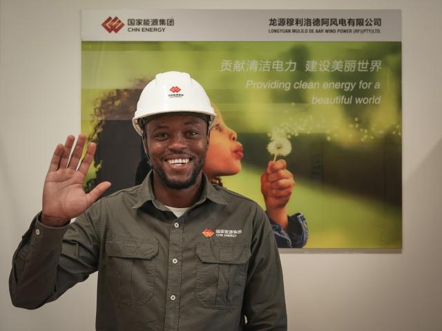 (251109) -- CAPE TOWN, Nov. 9, 2025 (Xinhua) -- Daswin Basson poses for a photo at a substation of De Aar Wind Power Project in De Aar, Northern Cape, South Africa, Oct. 22, 2025.
  TO GO WITH "Feature: Chinese-built wind power project empowers locals, improves lives in South Africa" (Xinhua/Han Xu)