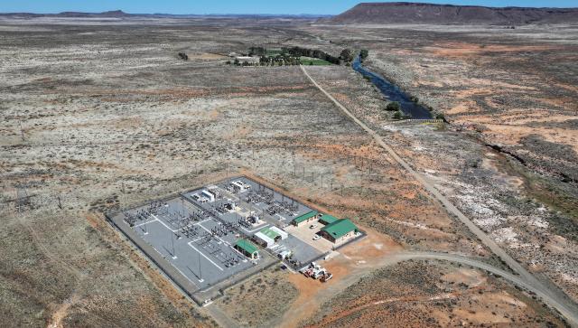 (251109) -- CAPE TOWN, Nov. 9, 2025 (Xinhua) -- An aerial drone photo taken on Oct. 22, 2025 shows a substation of De Aar Wind Power Project in De Aar, Northern Cape, South Africa.
  TO GO WITH "Feature: Chinese-built wind power project empowers locals, improves lives in South Africa" (Xinhua/Han Xu)
