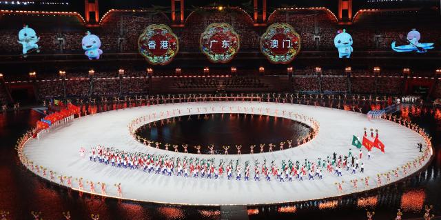 (251109) -- GUANGZHOU, Nov. 9, 2025 (Xinhua) -- Members of Guangdong, Hong Kong and Macao delegations parade during the opening ceremony of China's 15th National Games in Guangzhou, south China's Guangdong Province, Nov. 9, 2025. (Xinhua/Lu Hanxin)