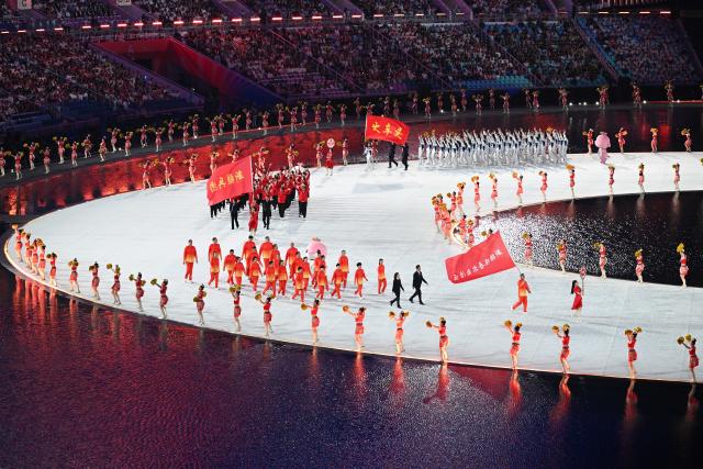 (251109) -- GUANGZHOU, Nov. 9, 2025 (Xinhua) -- Delegates parade during the opening ceremony of China's 15th National Games in Guangzhou, south China's Guangdong Province, Nov. 9, 2025. (Xinhua/Hu Huhu)