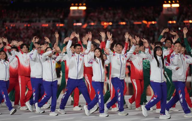 (251109) -- GUANGZHOU, Nov. 9, 2025 (Xinhua) -- Members of Guangdong, Hong Kong and Macao delegations parade during the opening ceremony of China's 15th National Games in Guangzhou, south China's Guangdong Province, Nov. 9, 2025. (Xinhua/Du Yu)