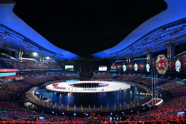 (251109) -- GUANGZHOU, Nov. 9, 2025 (Xinhua) -- Delegates parade during the opening ceremony of China's 15th National Games in Guangzhou, south China's Guangdong Province, Nov. 9, 2025. (Xinhua/Hu Huhu)