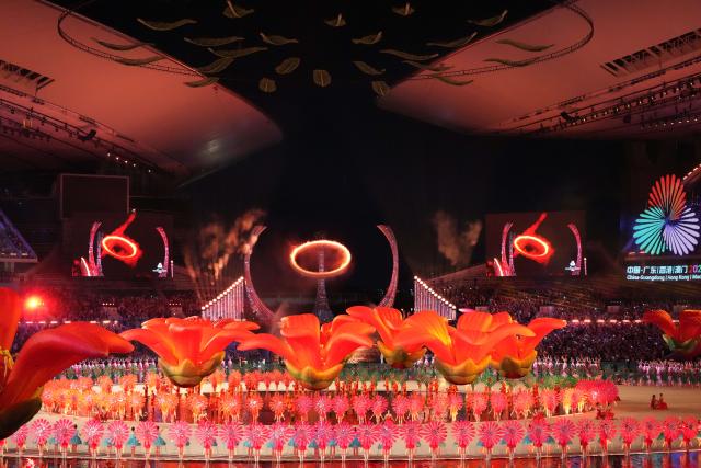 (251109) -- GUANGZHOU, Nov. 9, 2025 (Xinhua) -- The cauldron is lit during the opening ceremony of China's 15th National Games in Guangzhou, south China's Guangdong Province, Nov. 9, 2025. (Xinhua/Sun Fei)