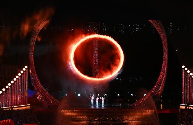 (251109) -- GUANGZHOU, Nov. 9, 2025 (Xinhua) -- The cauldron is lit during the opening ceremony of China's 15th National Games in Guangzhou, south China's Guangdong Province, Nov. 9, 2025. (Xinhua/Hu Huhu)