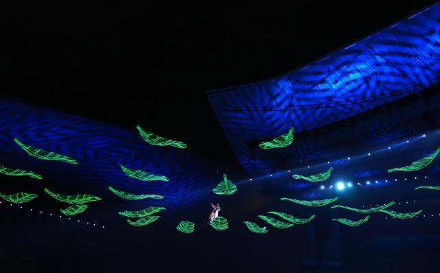 (251109) -- GUANGZHOU, Nov. 9, 2025 (Xinhua) -- An artist performs during the opening ceremony of China's 15th National Games in Guangzhou, south China's Guangdong Province, Nov. 9, 2025. (Xinhua/Wu Lu)