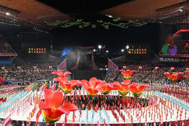 (251109) -- GUANGZHOU, Nov. 9, 2025 (Xinhua) -- Artists perform during the opening ceremony of China's 15th National Games in Guangzhou, south China's Guangdong Province, Nov. 9, 2025. (Xinhua/Hu Huhu)