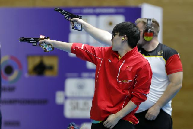 (251109) -- CAIRO, Nov. 9, 2025 (Xinhua) -- Ni Zhixin (front) of China competes during the 25m rapid fire pistol men's final of shooting at the 2025 ISSF World Championship Rifle/Pistol in Cairo, Egypt, on Nov. 9, 2025. (Xinhua/Ahmed Gomaa)