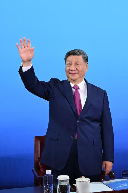 (251109) -- GUANGZHOU, Nov. 9, 2025 (Xinhua) -- Chinese President Xi Jinping, also general secretary of the Communist Party of China Central Committee and chairman of the Central Military Commission, waves during the opening ceremony of China's 15th National Games in Guangzhou, south China's Guangdong Province, Nov. 9, 2025. Xi attended the opening ceremony and declared the Games open. (Xinhua/Yan Yan)