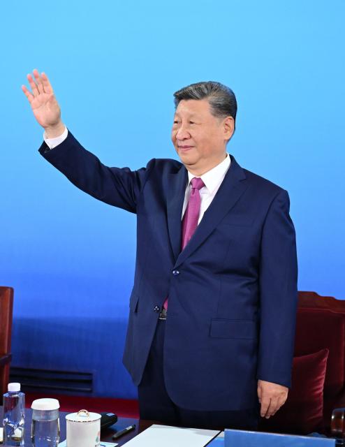 (251109) -- GUANGZHOU, Nov. 9, 2025 (Xinhua) -- Chinese President Xi Jinping, also general secretary of the Communist Party of China Central Committee and chairman of the Central Military Commission, waves during the opening ceremony of China's 15th National Games in Guangzhou, south China's Guangdong Province, Nov. 9, 2025. Xi attended the opening ceremony and declared the Games open. (Xinhua/Xie Huanchi)