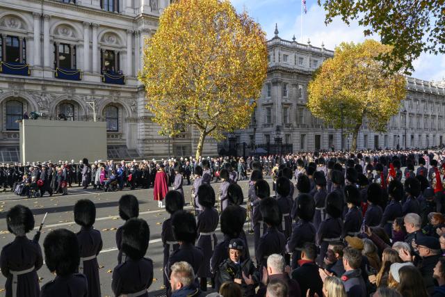 (251109) -- LONDON, Nov. 9, 2025 (Xinhua) -- People attend the Remembrance Sunday ceremony in London, Britain, on Nov. 9, 2025. The Remembrance Sunday ceremony is an annual event to pay tribute to the war dead of Britain and the Commonwealth, which is held on the nearest Sunday to the anniversary of the end of World War I on Nov. 11, 1918. (Photo by Ray Tang/Xinhua)