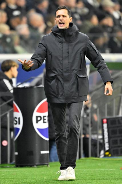 (251110) -- FRANKFURT, Nov. 10, 2025 (Xinhua) -- Dino Toppmoeller, head coach of Eintracht Frankfurt, reacts during the German first division Bundesliga football match between Eintracht Frankfurt and FSV Mainz 05 in Frankfurt, Germany, Nov. 9, 2025. (Photo by Ulrich Hufnagel/Xinhua)