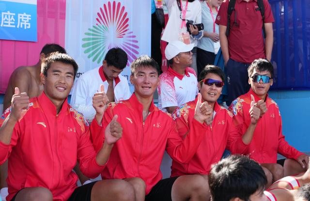 (251110) -- GUANGZHOU, Nov. 10, 2025 (Xinhua) -- Team Jiangsu celebrate after the men's quadruple sculls final of rowing at China's 15th National Games in Guangzhou, south China's Guangdong Province, Nov. 10, 2025. (Xinhua/Xiao Ennan)