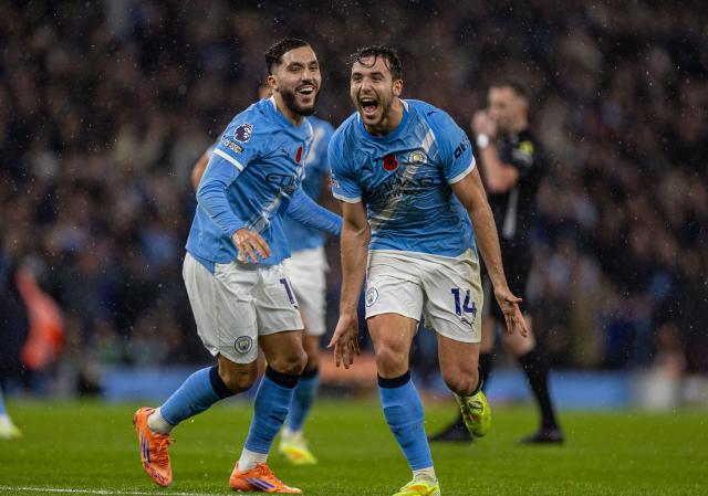 (251110) -- MANCHESTER, Nov. 10, 2025 (Xinhua) -- Manchester City's Nico Gonzalez (R) celebrates after scoring during the English Premier League match between Manchester City FC and Liverpool FC in Manchester, Britain, on Nov. 9, 2025. (Xinhua)
FOR EDITORIAL USE ONLY. NOT FOR SALE FOR MARKETING OR ADVERTISING CAMPAIGNS. NO USE WITH UNAUTHORIZED AUDIO, VIDEO, DATA, FIXTURE LISTS, CLUB/LEAGUE LOGOS OR "LIVE" SERVICES. ONLINE IN-MATCH USE LIMITED TO 45 IMAGES, NO VIDEO EMULATION. NO USE IN BETTING, GAMES OR SINGLE CLUB/LEAGUE/PLAYER PUBLICATIONS.