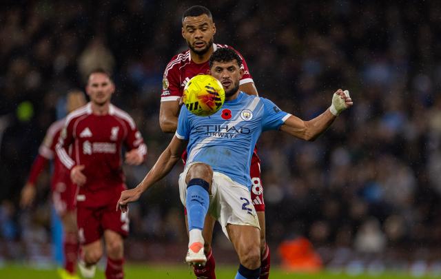 (251110) -- MANCHESTER, Nov. 10, 2025 (Xinhua) -- Manchester City's Matheus Nunes (front) is challenged by Liverpool's Cody Gakpo during the English Premier League match between Manchester City FC and Liverpool FC in Manchester, Britain, on Nov. 9, 2025. (Xinhua)
FOR EDITORIAL USE ONLY. NOT FOR SALE FOR MARKETING OR ADVERTISING CAMPAIGNS. NO USE WITH UNAUTHORIZED AUDIO, VIDEO, DATA, FIXTURE LISTS, CLUB/LEAGUE LOGOS OR "LIVE" SERVICES. ONLINE IN-MATCH USE LIMITED TO 45 IMAGES, NO VIDEO EMULATION. NO USE IN BETTING, GAMES OR SINGLE CLUB/LEAGUE/PLAYER PUBLICATIONS.