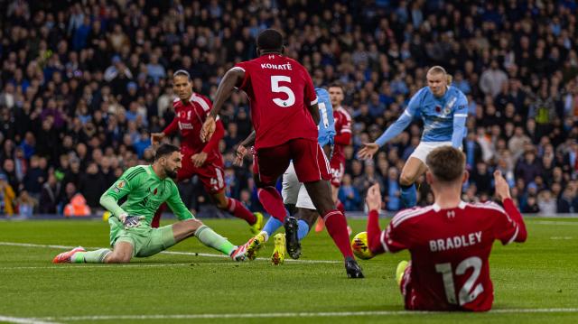 (251110) -- MANCHESTER, Nov. 10, 2025 (Xinhua) -- Liverpool's goalkeeper Giorgi Mamardashvili (1st L) brings down Manchester City's Jeremy Doku for a penalty-kick during the English Premier League match between Manchester City FC and Liverpool FC in Manchester, Britain, on Nov. 9, 2025. (Xinhua)
FOR EDITORIAL USE ONLY. NOT FOR SALE FOR MARKETING OR ADVERTISING CAMPAIGNS. NO USE WITH UNAUTHORIZED AUDIO, VIDEO, DATA, FIXTURE LISTS, CLUB/LEAGUE LOGOS OR "LIVE" SERVICES. ONLINE IN-MATCH USE LIMITED TO 45 IMAGES, NO VIDEO EMULATION. NO USE IN BETTING, GAMES OR SINGLE CLUB/LEAGUE/PLAYER PUBLICATIONS.