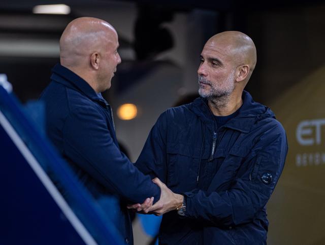 (251110) -- MANCHESTER, Nov. 10, 2025 (Xinhua) -- Manchester City's head coach Pep Guardiola (R) and Liverpool's head coach Arne Slot greet each other before the English Premier League match between Manchester City FC and Liverpool FC in Manchester, Britain, on Nov. 9, 2025. (Xinhua)
FOR EDITORIAL USE ONLY. NOT FOR SALE FOR MARKETING OR ADVERTISING CAMPAIGNS. NO USE WITH UNAUTHORIZED AUDIO, VIDEO, DATA, FIXTURE LISTS, CLUB/LEAGUE LOGOS OR "LIVE" SERVICES. ONLINE IN-MATCH USE LIMITED TO 45 IMAGES, NO VIDEO EMULATION. NO USE IN BETTING, GAMES OR SINGLE CLUB/LEAGUE/PLAYER PUBLICATIONS.