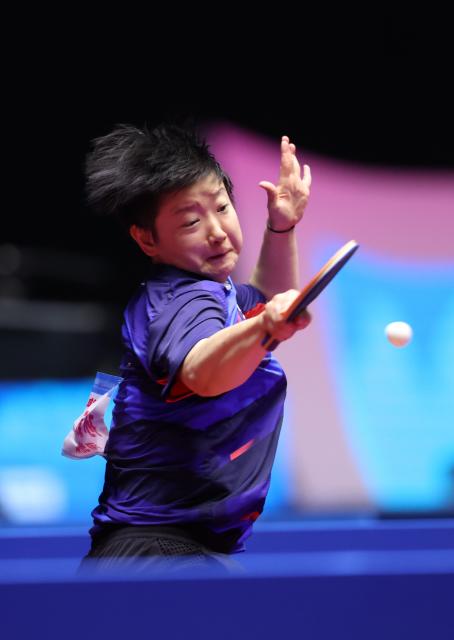 (251110) -- MACAO, Nov. 10, 2025 (Xinhua) -- Sun Yingsha hits a return during the table tennis women's singles round of 32 match between Sun Yingsha of Hebei and Liu Weishan of Tianjin at China's 15th National Games in Macao, south China, Nov. 10, 2025. (Xinhua/Liang Xu)
