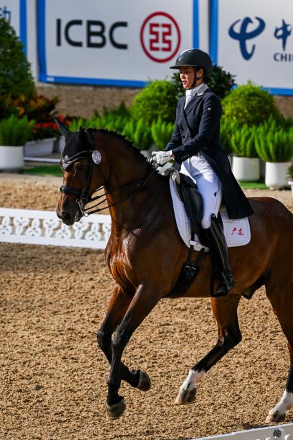 (251110) -- SHENZHEN, Nov. 10, 2025 (Xinhua) -- Huang Lixing of Guangdong competes during the equestrian dressage team final at China's 15th National Games in Shenzhen, south China's Guangdong Province, Nov. 10, 2025. (Xinhua/Lian Zhen)