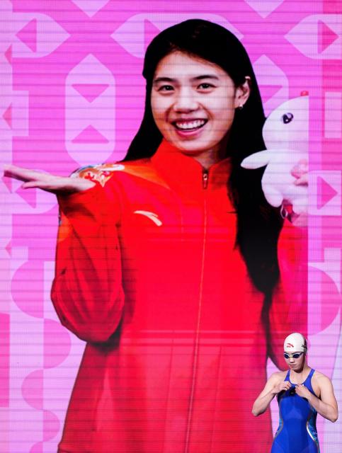 (251110) -- SHENZHEN, Nov. 10, 2025 (Xinhua) -- Zhang Yufei of Jiangsu reacts before the women's 100m butterfly semifinal of swimming event at China's 15th National Games in Shenzhen, south China's Guangdong Province, Nov. 10, 2025. (Xinhua/Du Yu)
