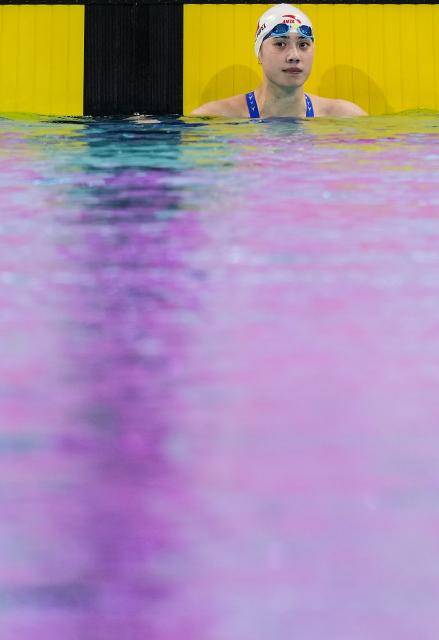 (251110) -- SHENZHEN, Nov. 10, 2025 (Xinhua) -- Zhang Yufei of Jiangsu reacts after the women's 100m butterfly semifinal of swimming event at China's 15th National Games in Shenzhen, south China's Guangdong Province, Nov. 10, 2025. (Xinhua/Du Yu)