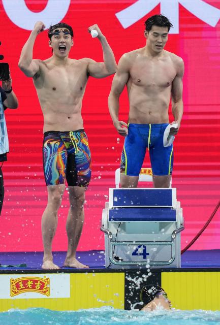 (251110) -- SHENZHEN, Nov. 10, 2025 (Xinhua) -- Team Zhejiang celebrate after the men's 4X100m freestyle relay final of swimming event at China's 15th National Games in Shenzhen, south China's Guangdong Province, Nov. 10, 2025. (Xinhua/Du Yu)