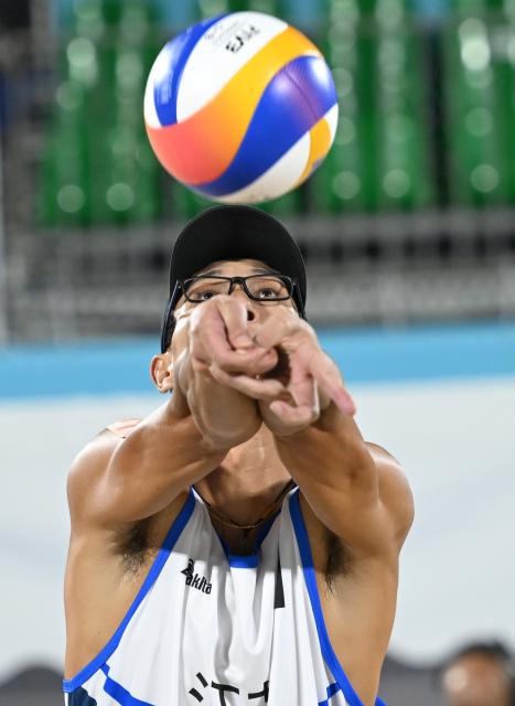 (251110) -- HONG KONG, Nov. 10, 2025 (Xinhua) -- Wu Jiaxin of Jiangsu competes during the beach volleyball men's final between Wu Jiaxin/Zhou Chaowei of Jiangsu and Li Zhuoxin/Xue Tao of Liaoning at China's 15th National Games in Hong Kong, south China, Nov. 10, 2025. (Xinhua/Hu Huhu)