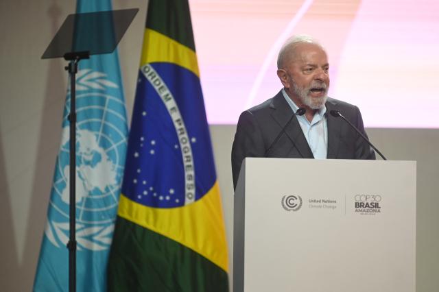 (251110) -- BELEM(BRAZIL), Nov. 10, 2025 (Xinhua) -- Brazilian President Luiz Inacio Lula da Silva speaks during the opening ceremony of the 30th United Nations climate change conference in Belem, Brazil, Nov. 10, 2025. The 30th United Nations climate change conference, commonly known as COP30, opened Monday in Belem, in the Brazilian state of Para, with the aim of putting the fight against climate change back in the center of international priorities, according to local authorities. (Photo by Lucio Tavora/Xinhua)