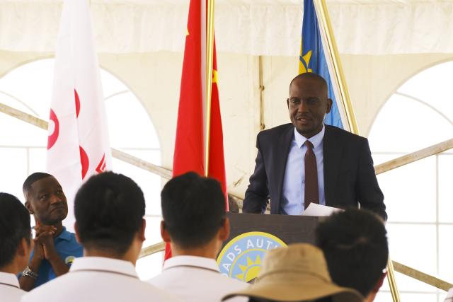 (251110) -- WINDHOEK, Nov. 10, 2025 (Xinhua) -- Veikko Nekundi, Namibia's Minister of Works and Transport, delivers a speech during the inauguration ceremony of the Chinese-aided Dr. Hage G. Geingob Freeway in Windhoek, Namibia, Nov. 10, 2025. Namibia officially inaugurated the Dr. Hage G. Geingob Freeway on Monday in the capital, Windhoek, marking the completion of a landmark infrastructure project set to transform regional transport and boost economic development. (Xinhua/Lin Jing)