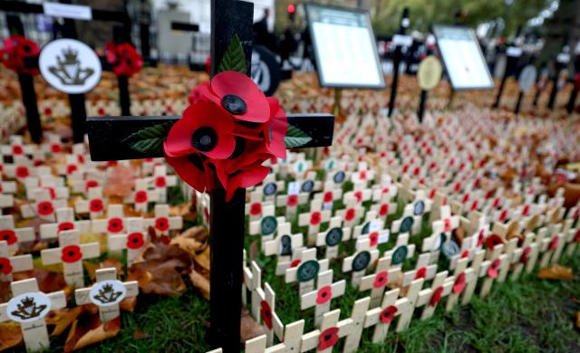 (251110) -- LONDON, Nov. 10, 2025 (Xinhua) -- Poppy petals and crosses are seen at the Field of Remembrance on the occasion of Remembrance Day at Westminster Abbey in London, Britain, Nov. 10, 2025. Remembrance Day is observed to remember the sacrifices made by soldiers during the WWI, which ended on Nov. 11, 1918. (Xinhua/Li Ying)