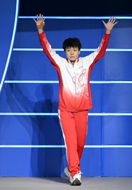 (251111) -- GUANGZHOU, Nov. 11, 2025 (Xinhua) -- Chen Yiwen of Guangdong reacts before the women's 3m springboard final of diving at China's 15th National Games in Guangzhou, south China's Guangdong Province, Nov. 11, 2025. (Xinhua/Xiao Yijiu)