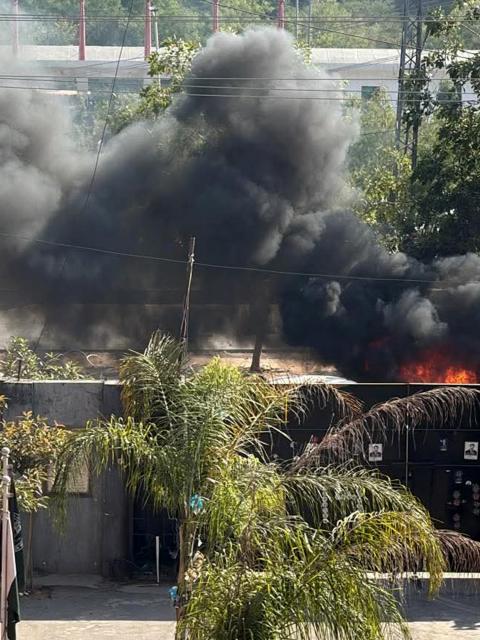 (251111) -- ISLAMABAD, Nov. 11, 2025 (Xinhua) -- This photo taken with a mobile phone on Nov. 11, 2025 shows the blast site in Islamabad, Pakistan. At least five people were killed and more than 10 others injured on Tuesday afternoon in a blast outside the district courts in Pakistan's capital Islamabad, police sources told Xinhua. (Str/Xinhua)