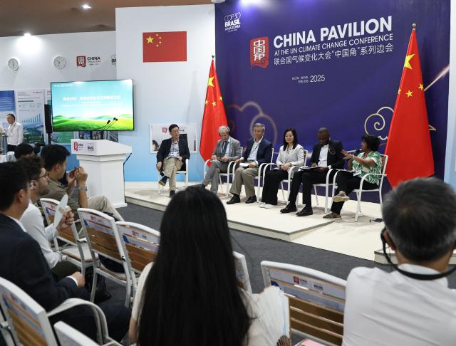 (251111) -- BELEM, Nov. 11, 2025 (Xinhua) -- A session focusing on ecological civilization and the practice of building a "Beautiful China" is held during the 30th UN Climate Change Conference (COP30) in Belem, Brazil, Nov. 10, 2025. On Monday, the "China Pavilion" series of the COP30 side events kicked off in Belem, with the first session focusing on ecological civilization and the practice of building a "Beautiful China."
   The series will continue through Nov. 20, with upcoming sessions covering topics such as the high-quality development and experience-sharing of China's carbon market, China's path toward carbon peaking and carbon neutrality, and China's energy transition and new energy development. (Photo by Claudia Martini/Xinhua)