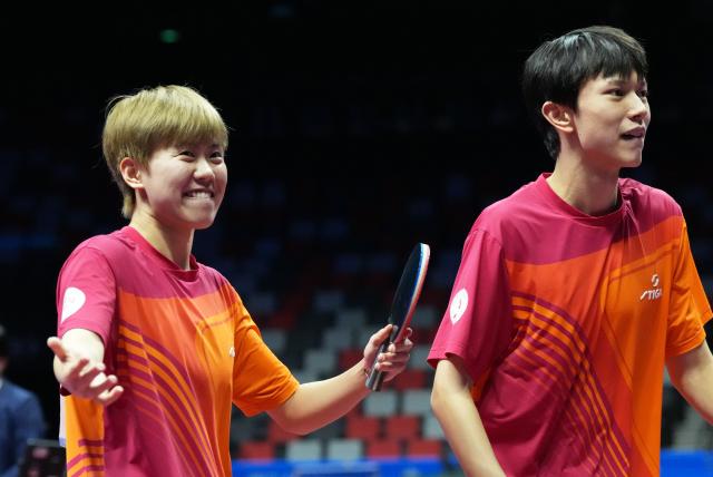 (251111) -- MACAO, Nov. 11, 2025 (Xinhua) -- Gao Yuxin (L)/Xia Zhipeng celebrate after the table tennis U18 mixed doubles final match between Gao Yuxin/Xia Zhipeng of Sichuan and Luo Jiecheng/Yao Zixuan of Fujian at China's 15th National Games in Macao, south China, Nov. 11, 2025. (Xinhua/Lai Xiangdong)