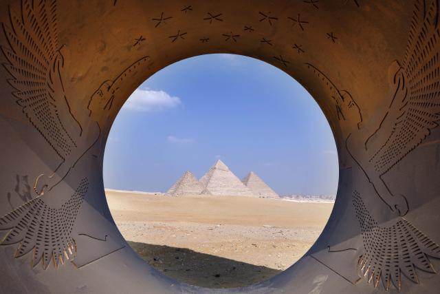 (251111) -- CAIRO, Nov. 11, 2025 (Xinhua) -- An artistic installation is displayed during the "Forever Is Now" international art exhibition at Giza Pyramids scenic spot in Giza, Egypt, Nov. 11, 2025. The fifth edition of "Forever Is Now" international art exhibition on Tuesday kicked off in the area of Egypt's Giza Pyramids scenic spot, showcasing 10 artworks of artists from different countries. The exhibition runs from Nov. 11 to Dec. 6. (Xinhua/Ahmed Gomaa)