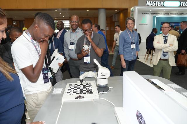 (251111) -- CAPE TOWN, Nov. 11, 2025 (Xinhua) -- People visit the AfricaCom exhibition during the Africa Tech Festival 2025 in Cape Town, South Africa, Nov. 11, 2025. The Africa Tech Festival kicked off on Tuesday in Cape Town, the legislative capital of South Africa, gathering innovators, policymakers, and investors to explore how technology can drive a more inclusive digital future for Africa. (Photo by Shakirah Thebus/Xinhua)