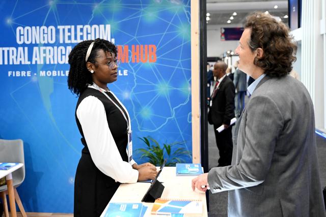 (251111) -- CAPE TOWN, Nov. 11, 2025 (Xinhua) -- People visit the AfricaCom exhibition during the Africa Tech Festival 2025 in Cape Town, South Africa, Nov. 11, 2025. The Africa Tech Festival kicked off on Tuesday in Cape Town, the legislative capital of South Africa, gathering innovators, policymakers, and investors to explore how technology can drive a more inclusive digital future for Africa. (Photo by Shakirah Thebus/Xinhua)