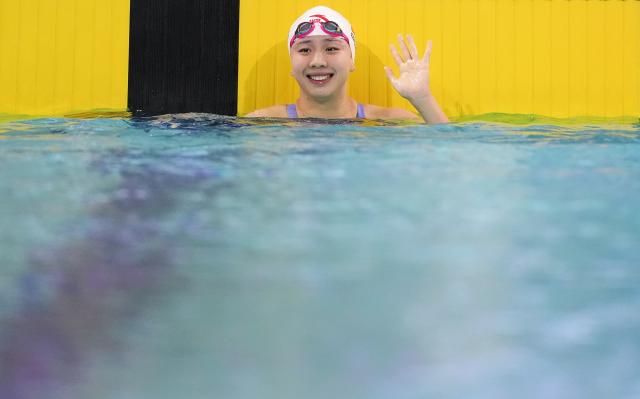 (251112) -- SHENZHEN, Nov. 12, 2025 (Xinhua) -- Tang Qianting of Shanghai reacts after the women's 100m breaststroke final of swimming at China's 15th National Games in Shenzhen, south China's Guangdong Province, Nov. 12, 2025. (Xinhua/Xue Yuge)