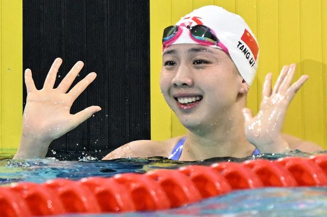 (251112) -- SHENZHEN, Nov. 12, 2025 (Xinhua) -- Tang Qianting of Shanghai reacts after the women's 100m breaststroke final of swimming at China's 15th National Games in Shenzhen, south China's Guangdong Province, Nov. 12, 2025. (Xinhua/Chen Yichen)