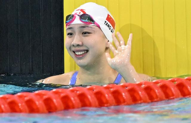 (251112) -- SHENZHEN, Nov. 12, 2025 (Xinhua) -- Tang Qianting of Shanghai reacts after the women's 100m breaststroke final of swimming at China's 15th National Games in Shenzhen, south China's Guangdong Province, Nov. 12, 2025. (Xinhua/Chen Yichen)